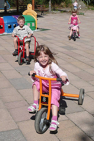 Mädchen mit Dreirad